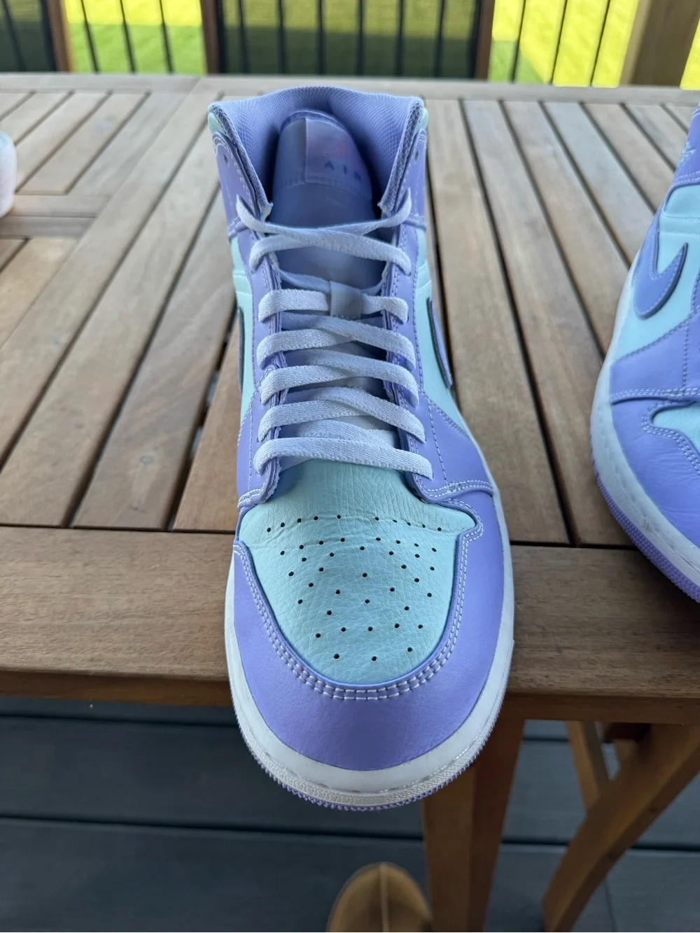Size 10.5 men’s Jordan Air Jordan 1 Mid Lavender and Mint Sneakers